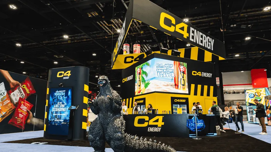 Black and yellow C4 Energy trade show exhibit