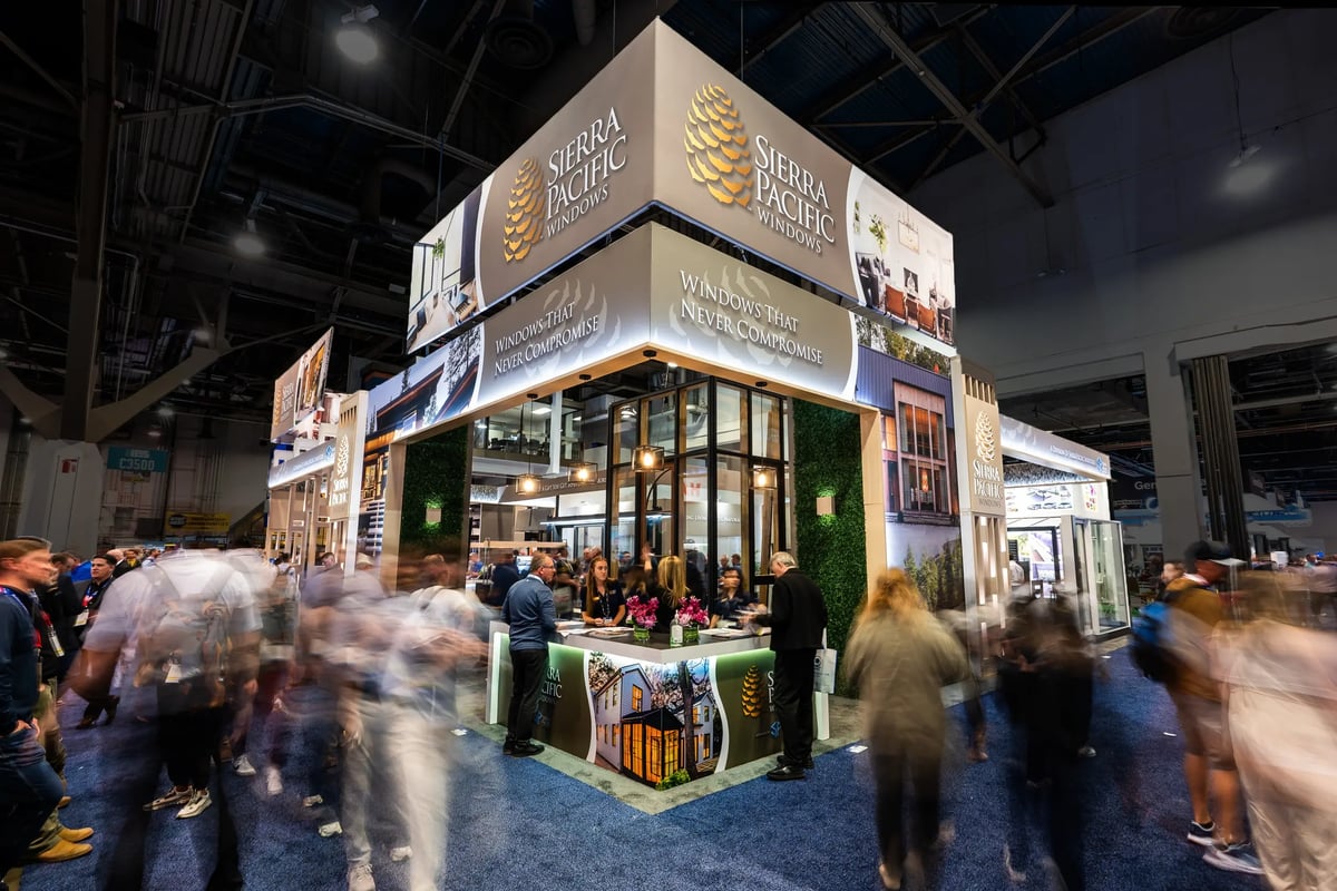 Large custom trade show exhibit with suspended signage
